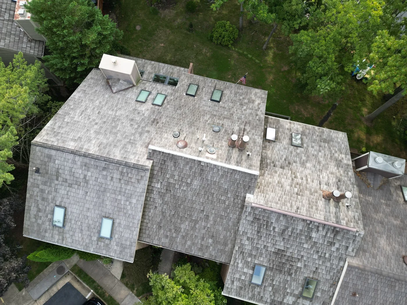 Cedar shake roof with skylights and vents, seen from above